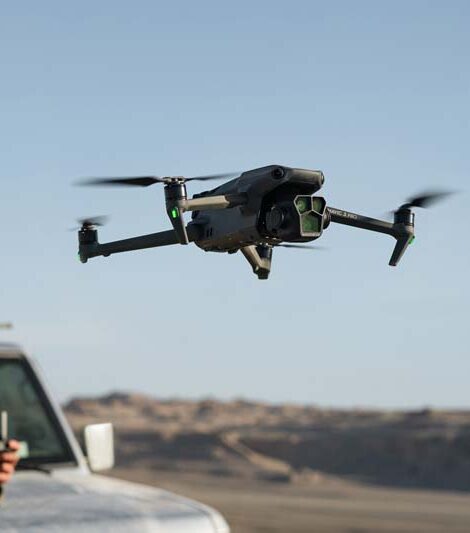 DJI Mavic 3 Pro while Flying in front of a car
