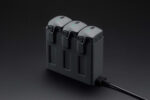Genuine DJI Mavic 4 Pro Parallel Charging Hub charging three batteries lifestyle